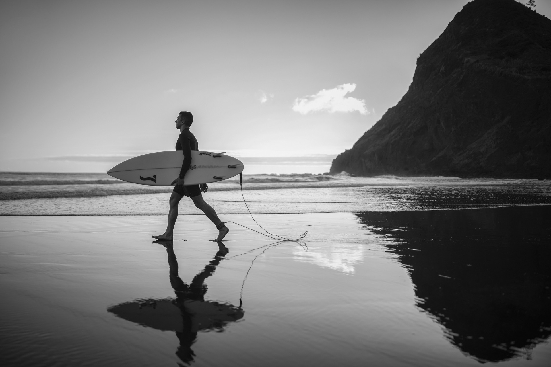 Black and white photo of professional surfer.